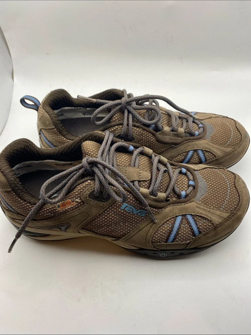 Teva Men's Brown Athletic Shoes with Blue Accents